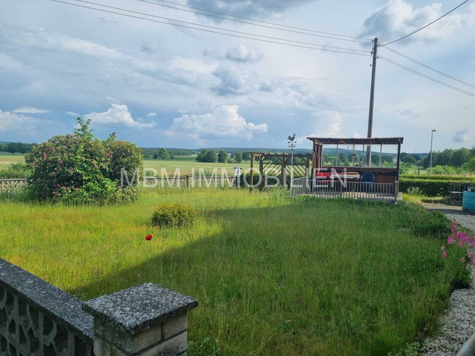 Traumhaftes Grundstück mit Einfamilienhaus in idyllischer Lage